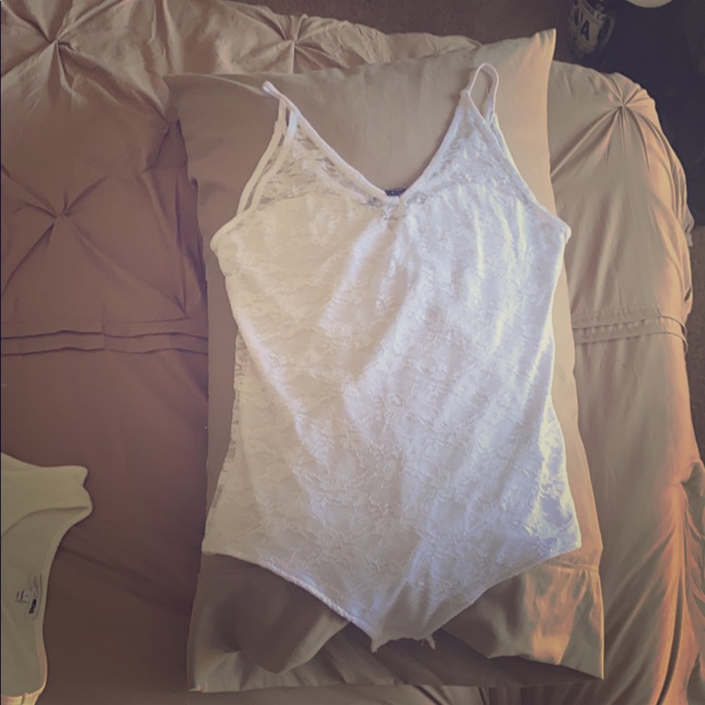 Brand new White Lace body suit